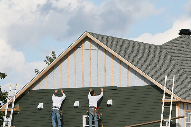 Professional Siding Replacement technician working in Crystal Beach, FL